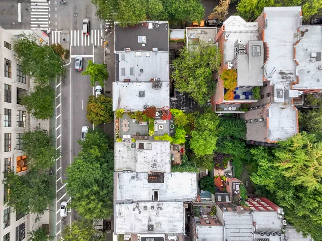 an aerial view of a house with a garden