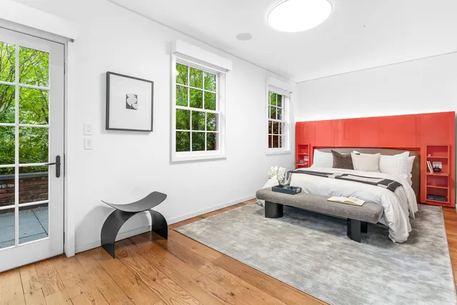 a view of a chairs and table in the patio