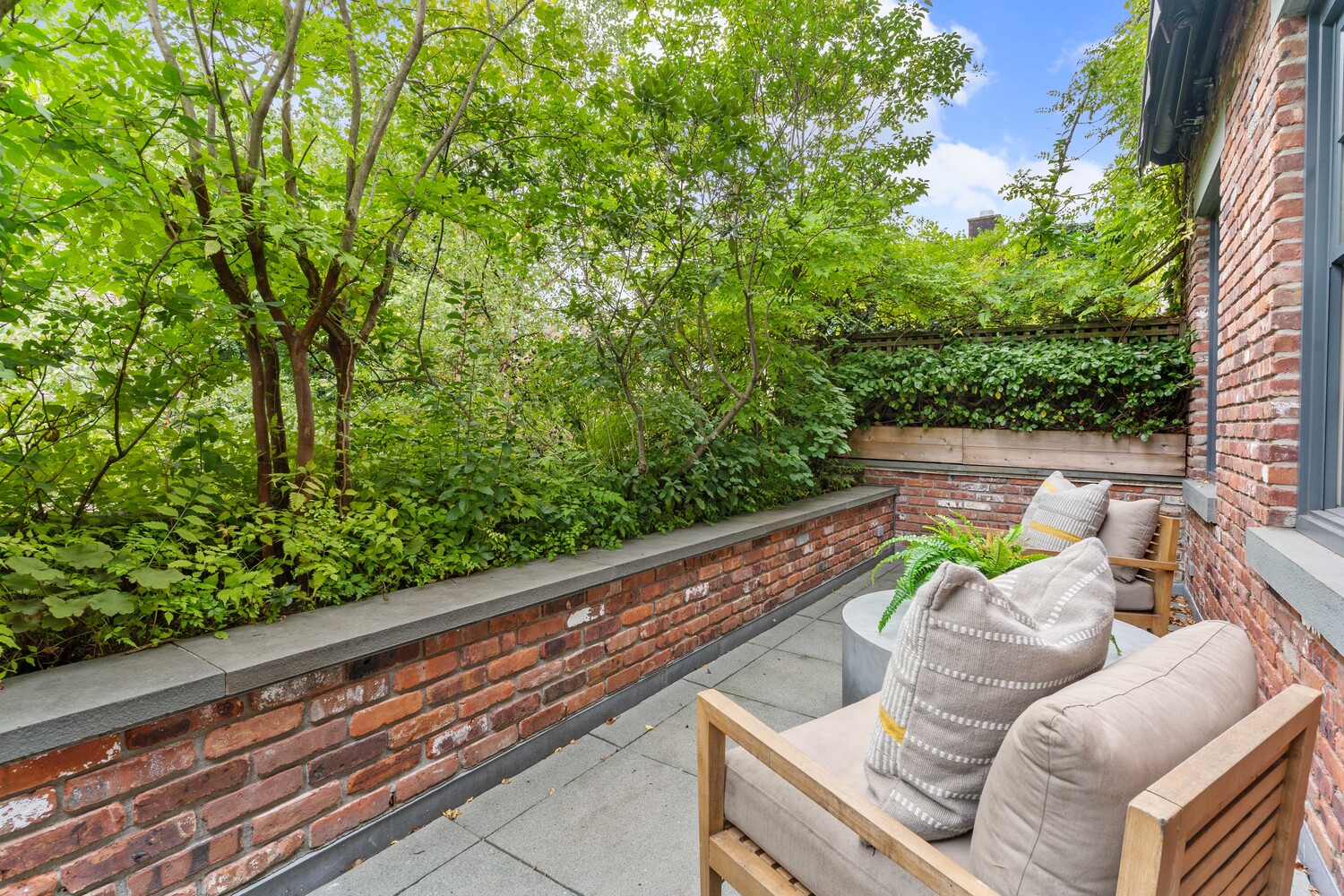 430 Hudson Street Manhattan, NY 10014 - Photo 9 of 35 a view of a chairs and table in the balcony