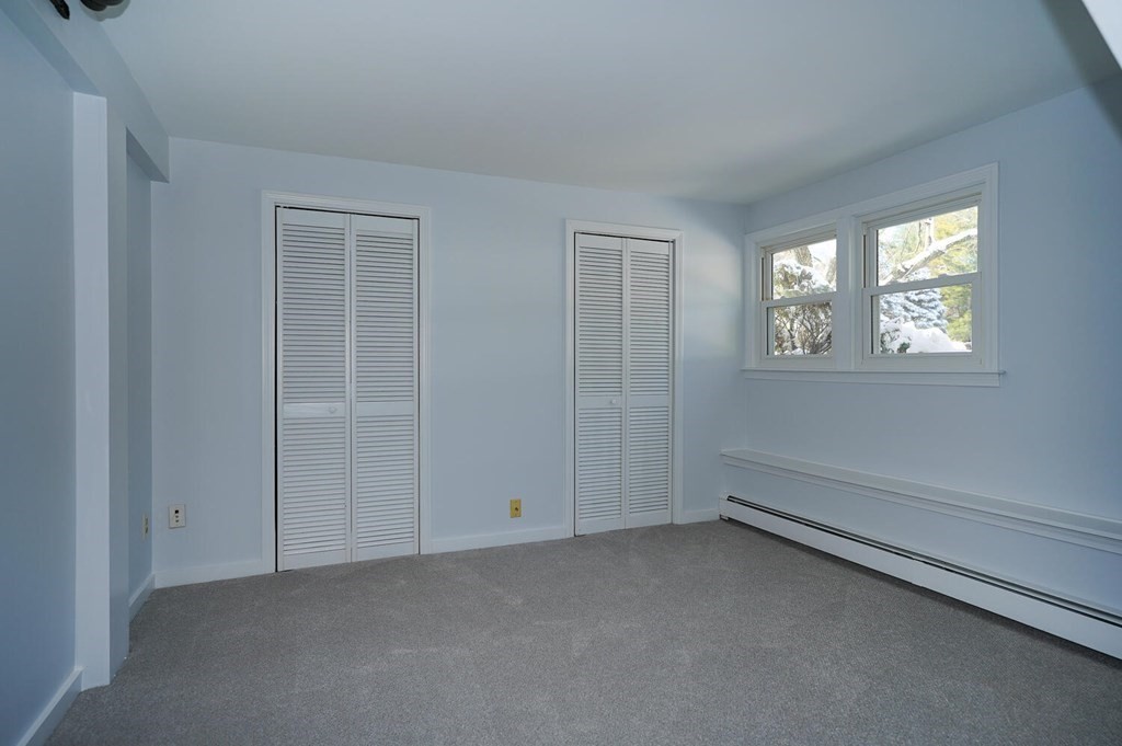 3 Rickey Drive Maynard, MA 01754 - Photo 15 of 25 an empty room with windows