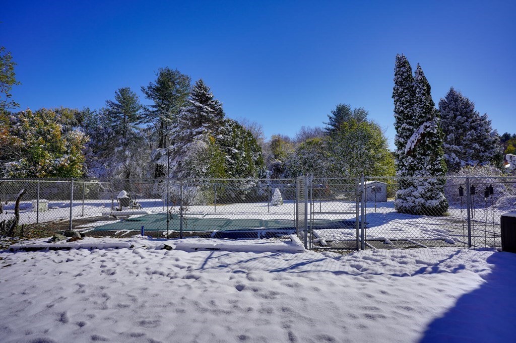 3 Rickey Drive Maynard, MA 01754 - Photo 20 of 25 a view of backyard with wooden fence