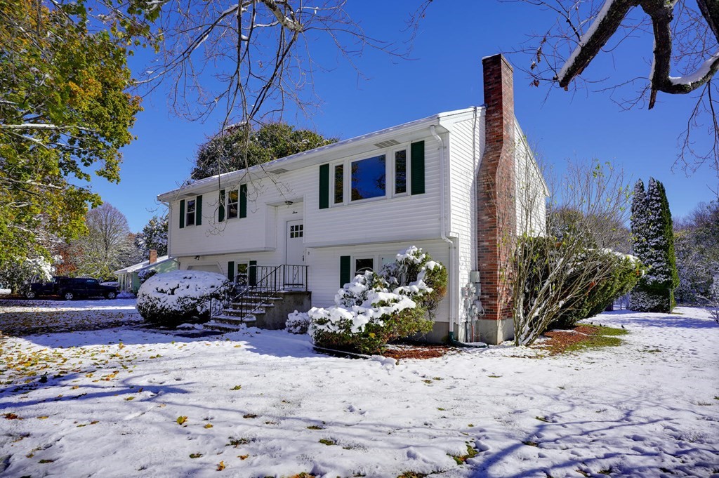 3 Rickey Drive Maynard, MA 01754 - Photo 23 of 25 a front view of a house with a yard