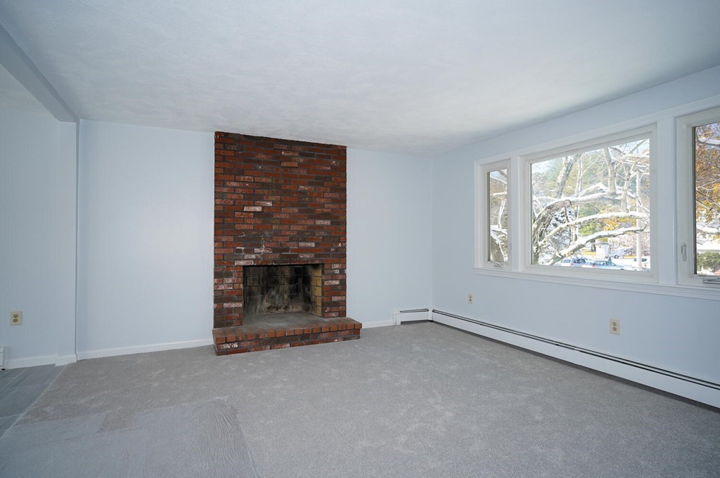 3 Rickey Drive Maynard, MA 01754 - Photo 6 of 25 an empty room with windows