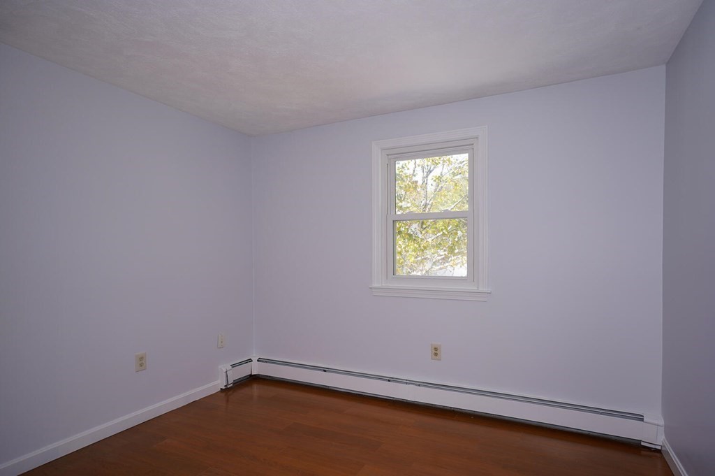 3 Rickey Drive Maynard, MA 01754 - Photo 8 of 25 an empty room with a window