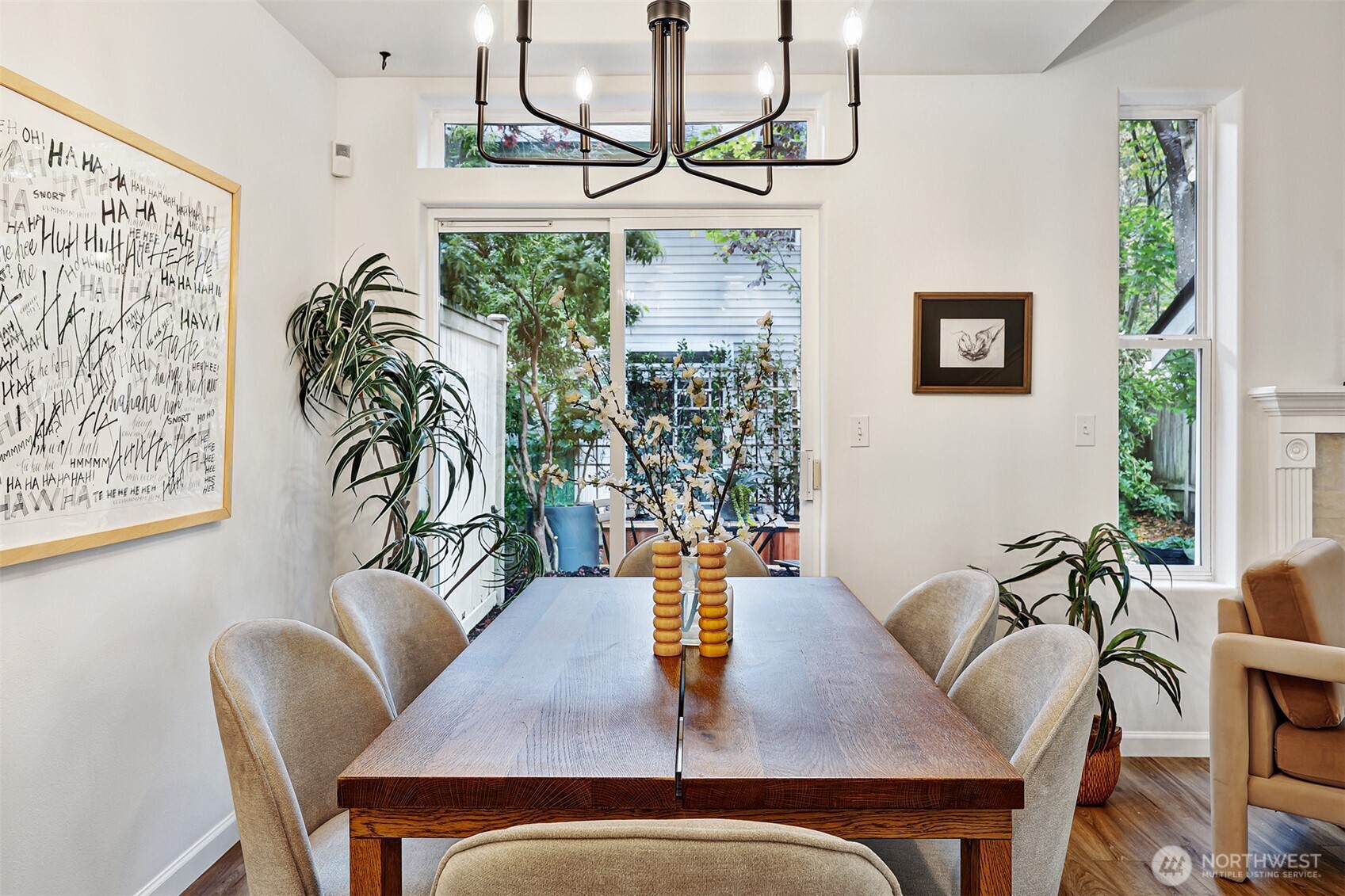 8828 238th Street Southwest, Unit B4 Edmonds, WA 98026 - Photo 11 of 37 a view of a dining room with furniture and a potted plant