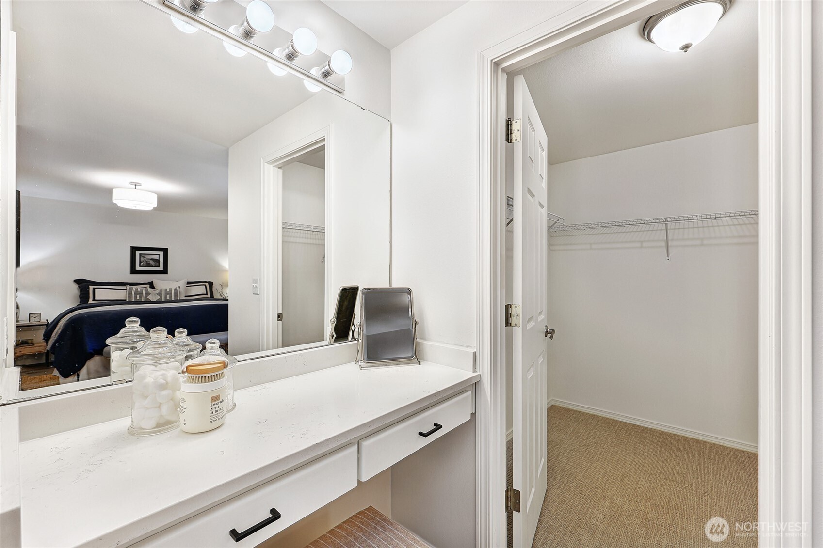 8828 238th Street Southwest, Unit B4 Edmonds, WA 98026 - Photo 22 of 37 a bathroom with a double vanity sink and a mirror