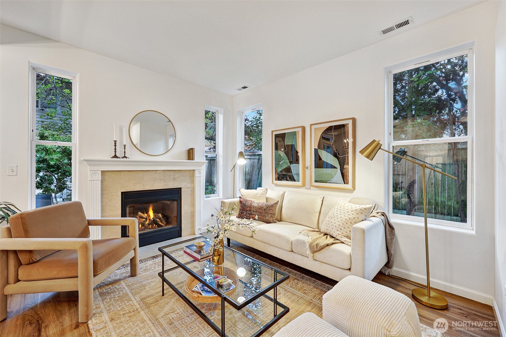 8828 238th Street Southwest, Unit B4 Edmonds, WA 98026 - Photo 4 of 37 a living room with furniture and a fireplace
