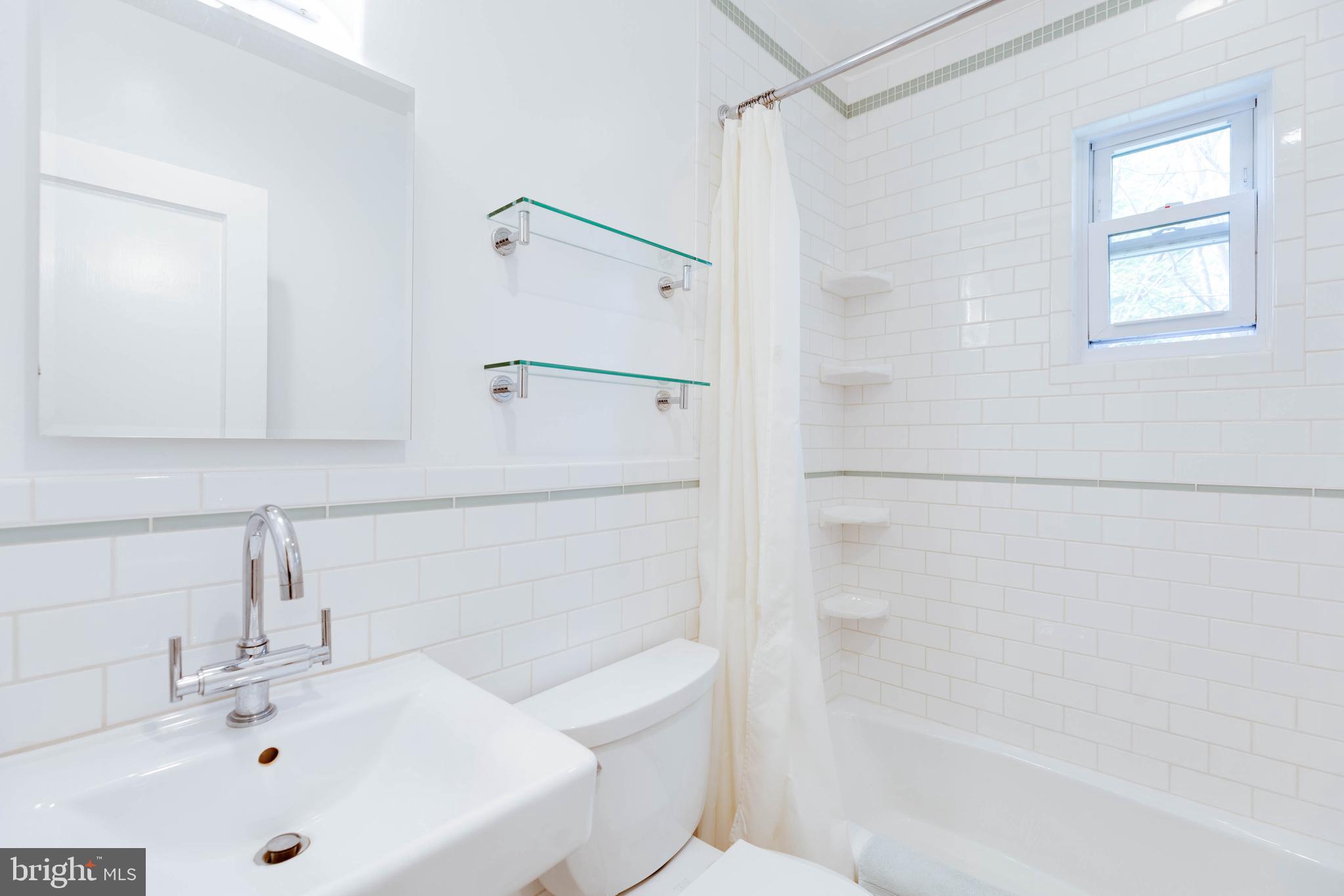 308 Franklin Place Silver Spring, MD 20901 - Photo 11 of 25 Main level full bathroom.