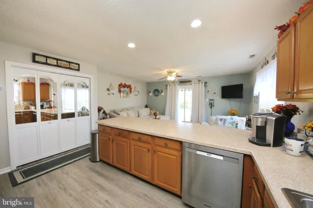 a room with a sink furniture and a mirror