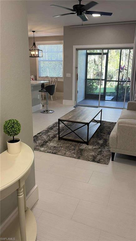 7940 Preserve Circle, Unit 914 Naples, FL 34119 - Photo 11 of 16 a living room with furniture