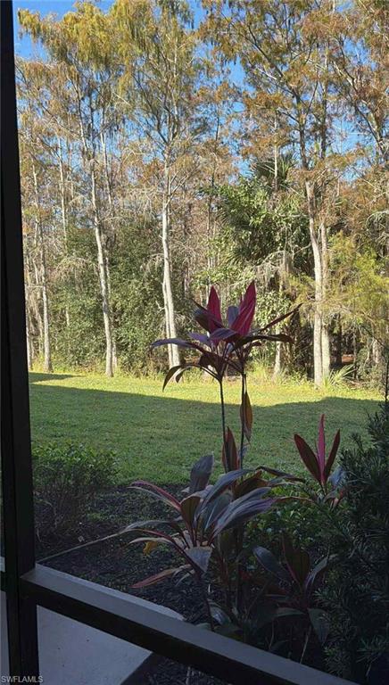 7940 Preserve Circle, Unit 914 Naples, FL 34119 - Photo 16 of 16 a view of a garden