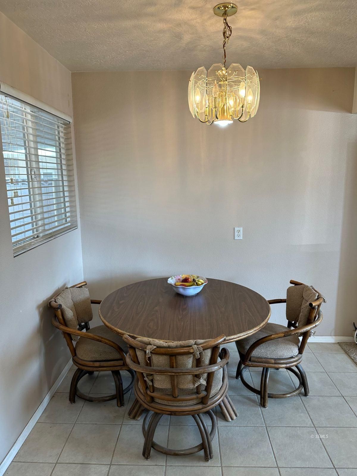 237 South Desert Candles Street Ridgecrest, CA 93555 - Photo 6 of 23 a room with furniture and a chandelier