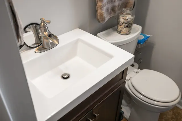 a bed room with furniture and a window