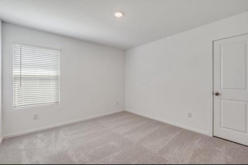 11345 Rodeo Drive Providence Village, TX 76227 - Photo 31 of 32 an empty room with a window