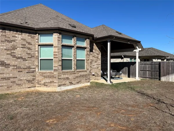 a view of house with outdoor space