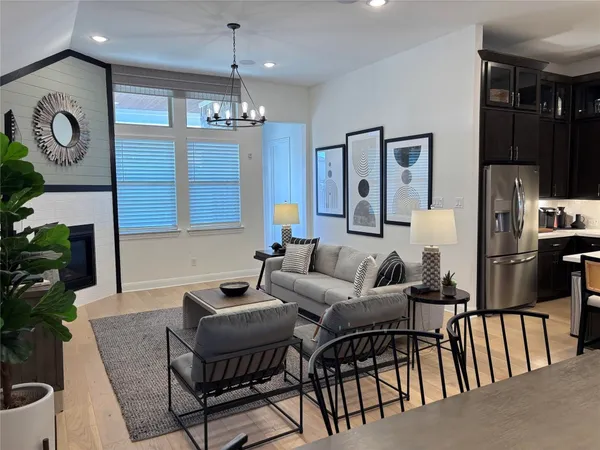 a kitchen with a dining table and chairs