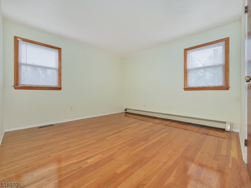 69 Rector Street Millburn, NJ 07041 - Photo 17 of 29 a view of an empty room with a window