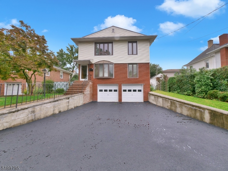 69 Rector Street Millburn, NJ 07041 - Photo 2 of 29 a view of a house with a yard