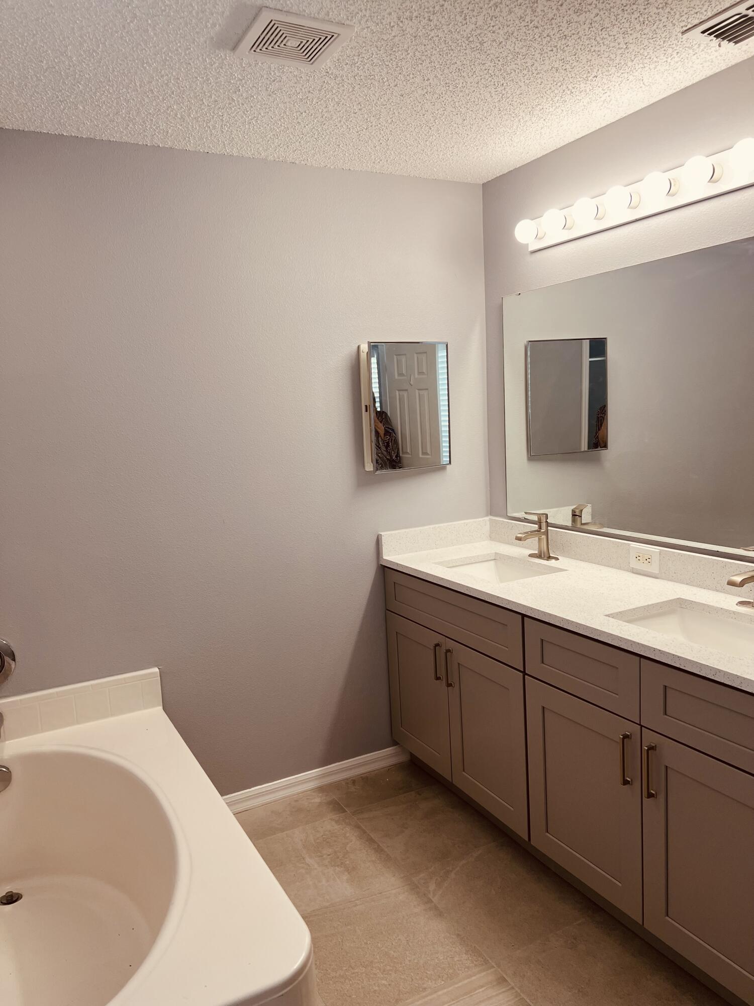 2497 Southwest Independence Road Port St. Lucie, FL 34953 - Photo 20 of 29 master bath