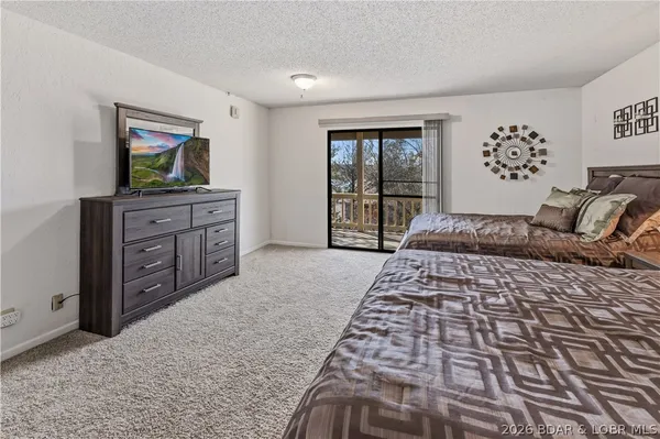$400,000 | 410 Hopetown Drive, Osage Beach, MO 65065