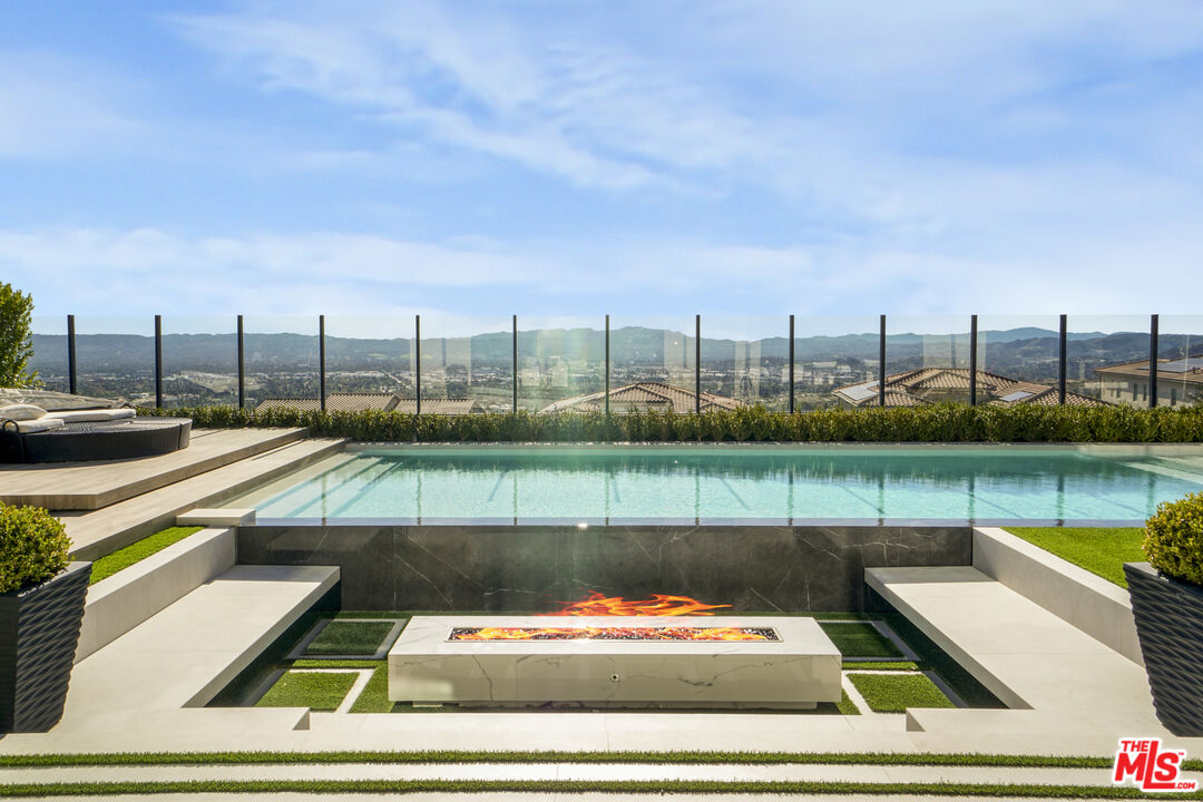 20306 Willoughby Lane Porter Ranch, CA 91326 - Photo 21 of 40 a view of a lake from a balcony