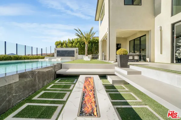 a view of a house with a swimming pool