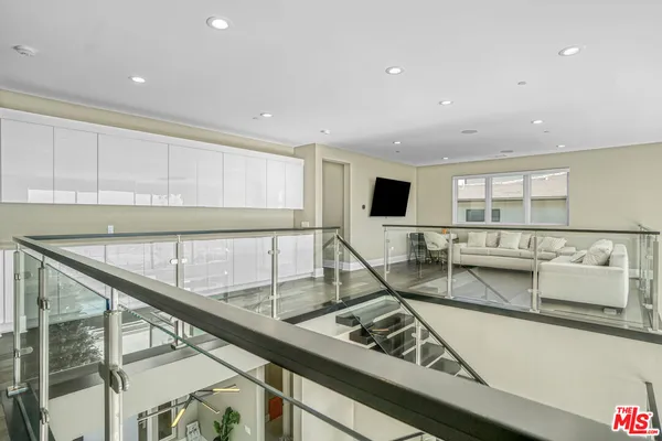 a spacious bedroom with a bed and a table