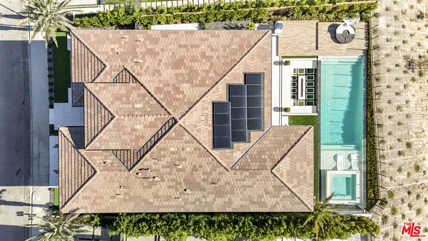 a view of residential houses with a city view