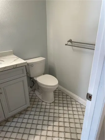 a bathroom with a toilet and a sink