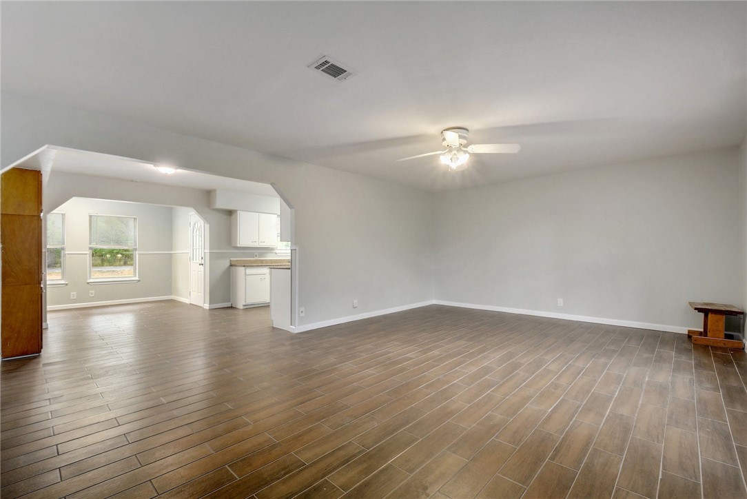 9911 Anderson Mill Road Austin, TX 78750 - Photo 9 of 29 Family Room next to Kitchen. *Note: Room painted since photo