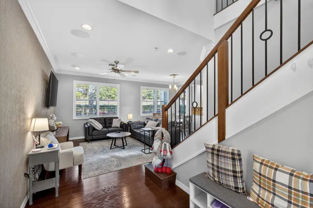 a bedroom with a bed a table and window