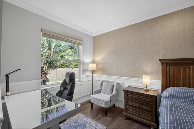 a front view of house with yard and yellow