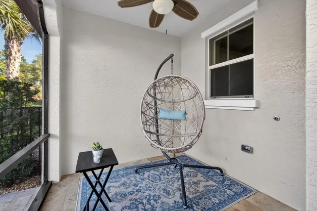 a view of a swimming pool with a patio