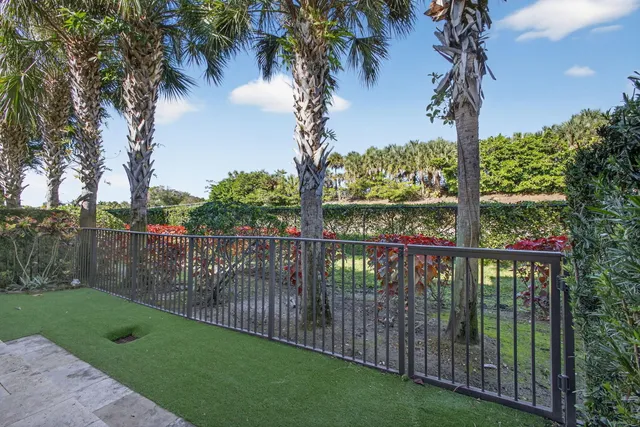 a view of house with swimming pool outdoor seating