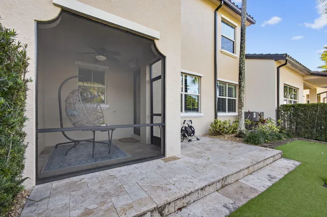 a view of a livingroom with furniture and a window
