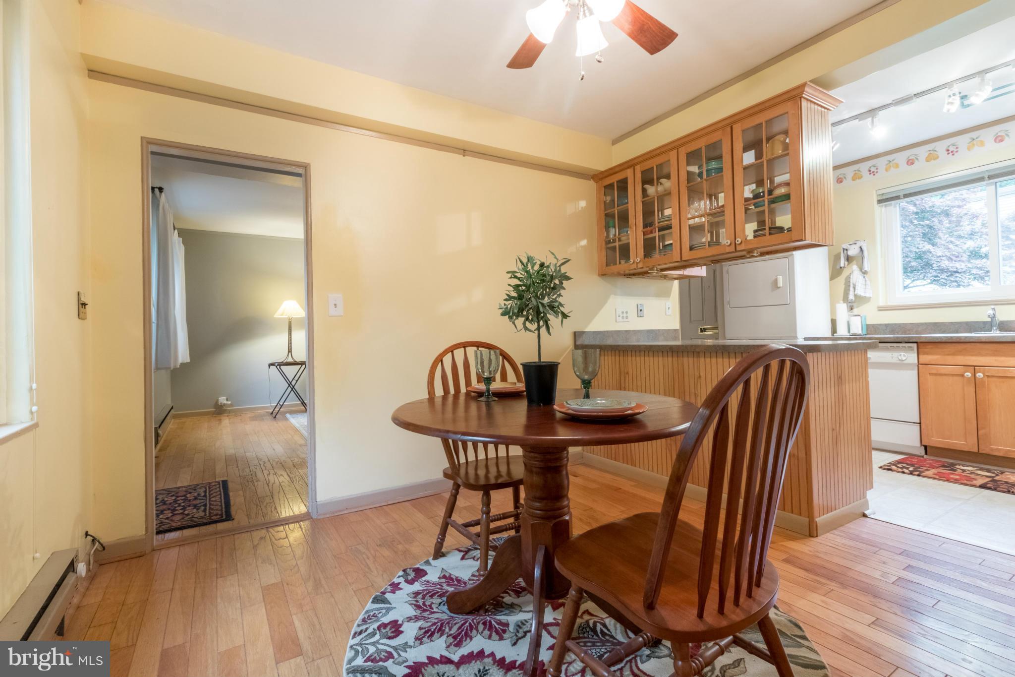 3 Crescent Road, Unit B Greenbelt, MD 20770 - Photo 6 of 22 a view of a dining room with furniture and wooden floor