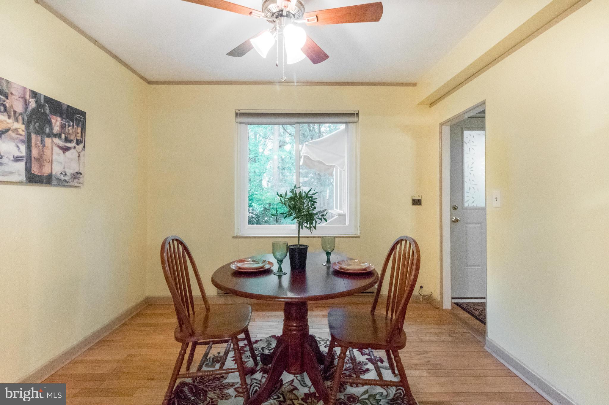 3 Crescent Road, Unit B Greenbelt, MD 20770 - Photo 10 of 22 a dining room with furniture and window