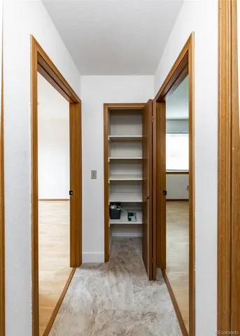 a view of a room with a wardrobe space