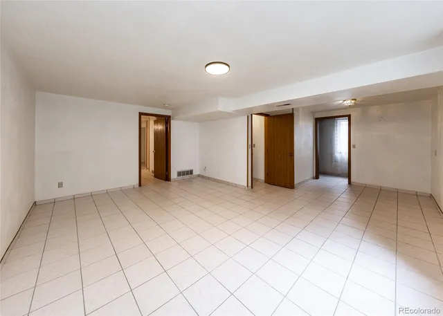 a view of an empty room with window