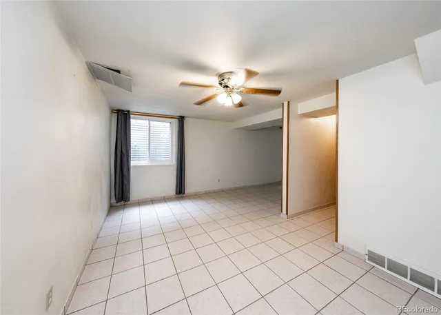 a view of an empty room with window