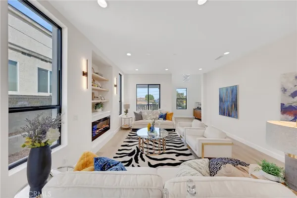 a living room with furniture and a couch
