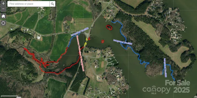 an aerial view of a city with lake view