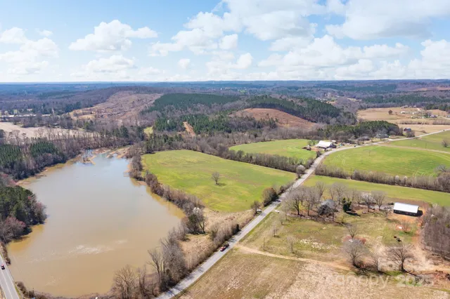 a view of a lake with a city