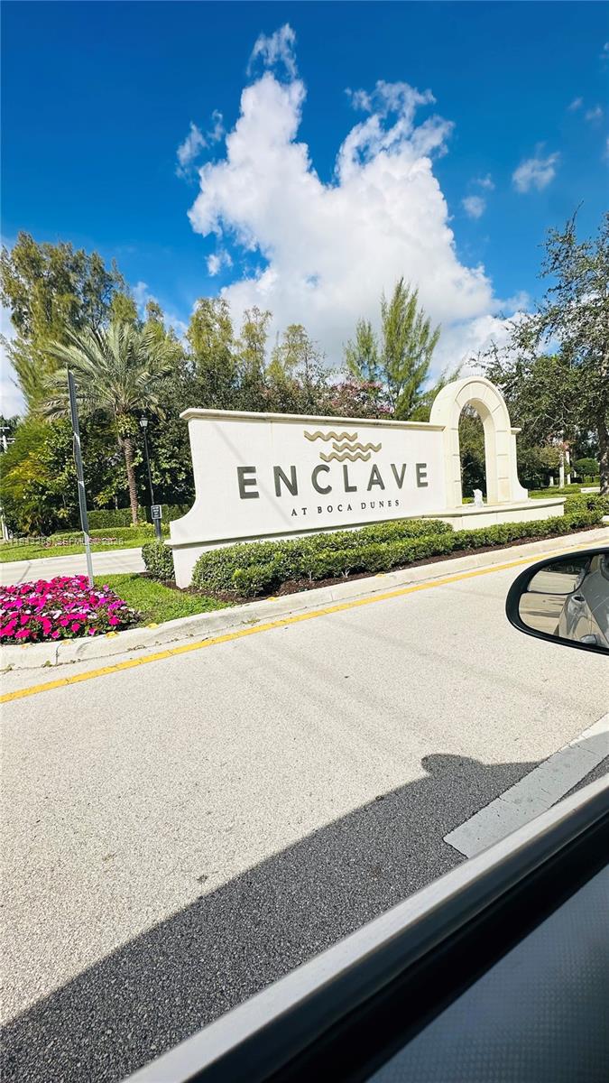 a sign that is on the side of a street