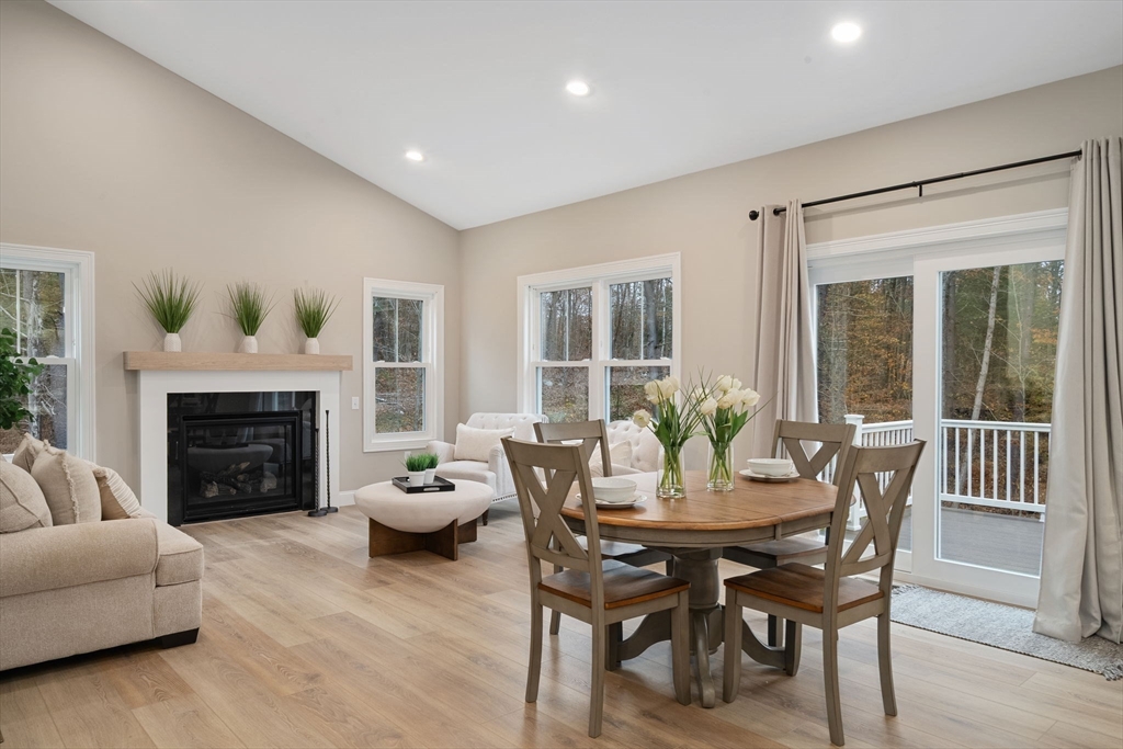 29-4 Sunset Road Westminster, MA 01473 - Photo 15 of 37 a living room with furniture and a fireplace