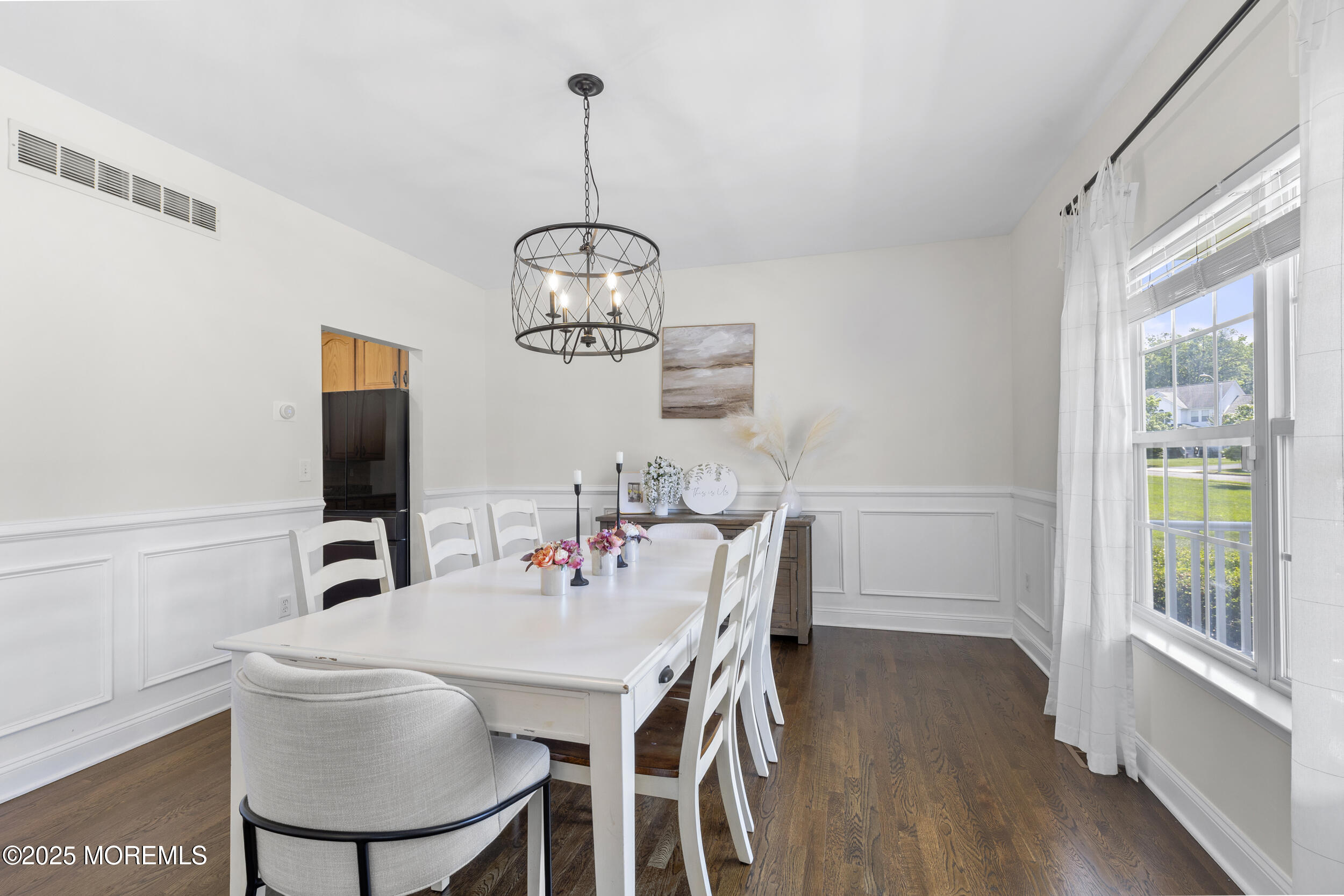 6 Kindling Way Jackson, NJ 08527 - Photo 12 of 54 a view of a dining room with furniture window and wooden floor