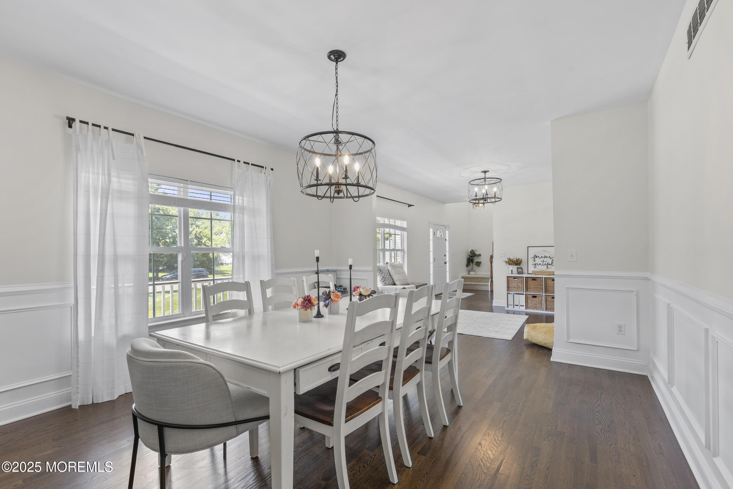 6 Kindling Way Jackson, NJ 08527 - Photo 13 of 54 a view of a dining room with furniture window and wooden floor