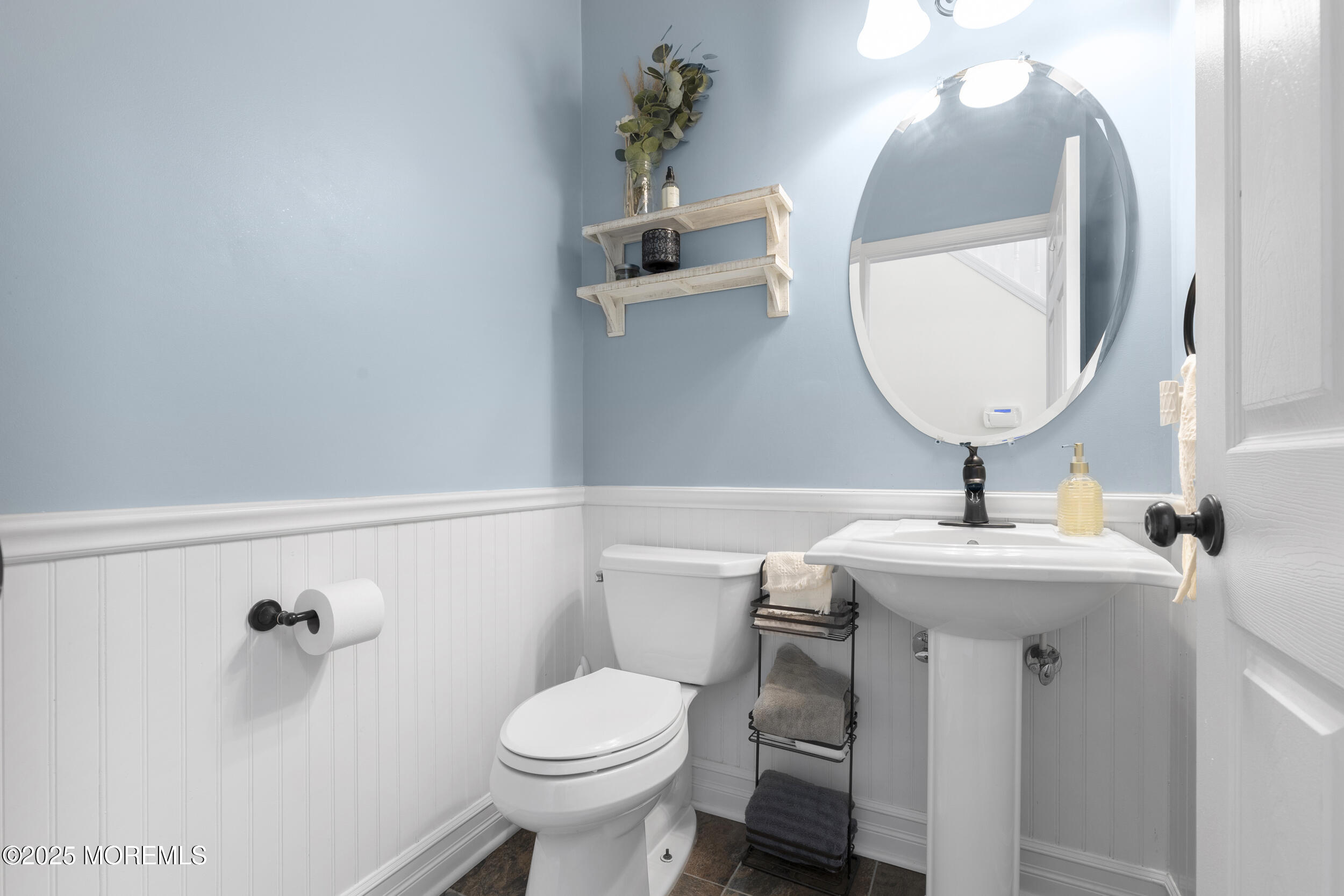 6 Kindling Way Jackson, NJ 08527 - Photo 20 of 54 a bathroom with a sink a toilet and mirror