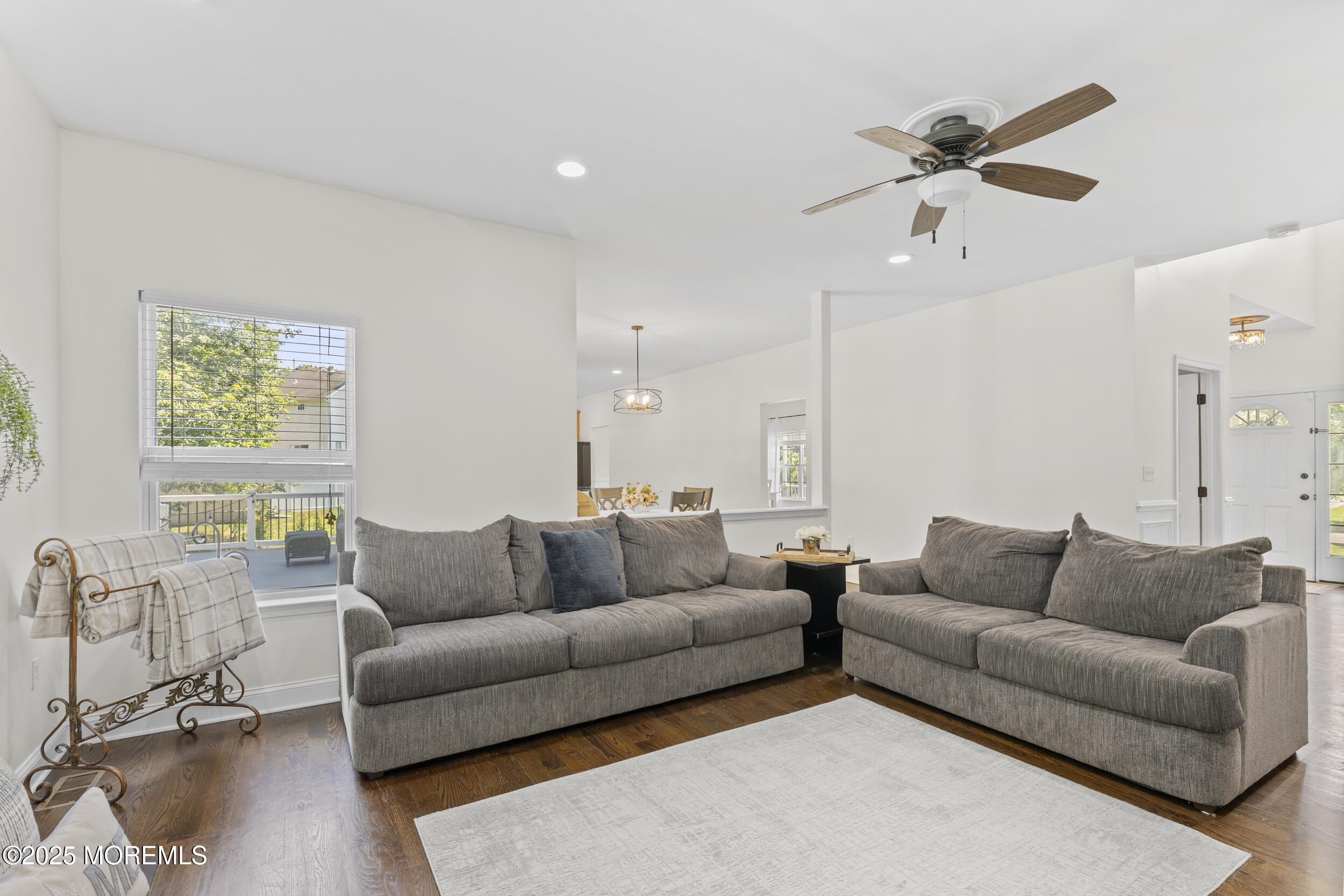6 Kindling Way Jackson, NJ 08527 - Photo 22 of 54 a living room with furniture and a large window