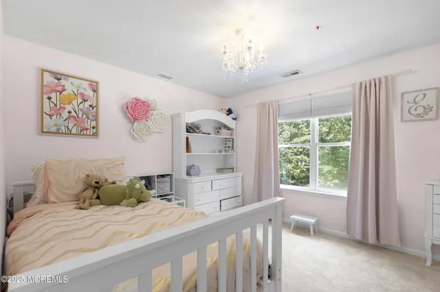 a room with gym equipment and windows